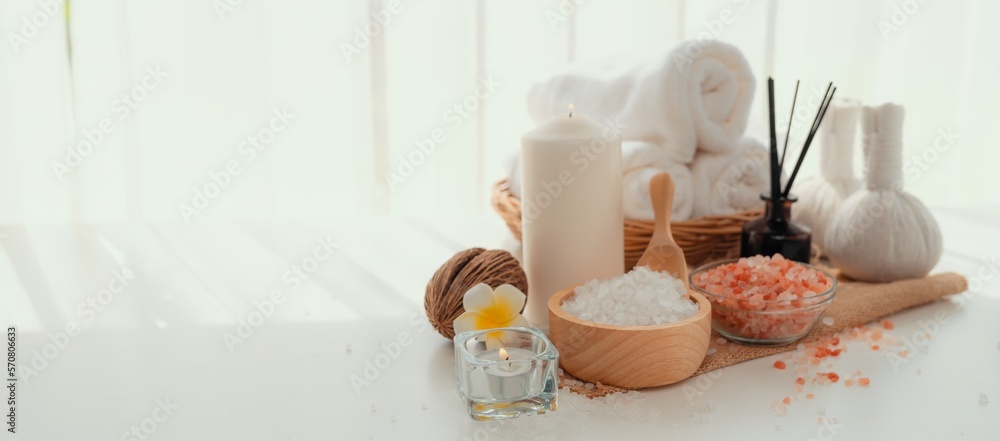 Spa accessory composition set in day spa hotel , beauty wellness center . Spa product are placed in 