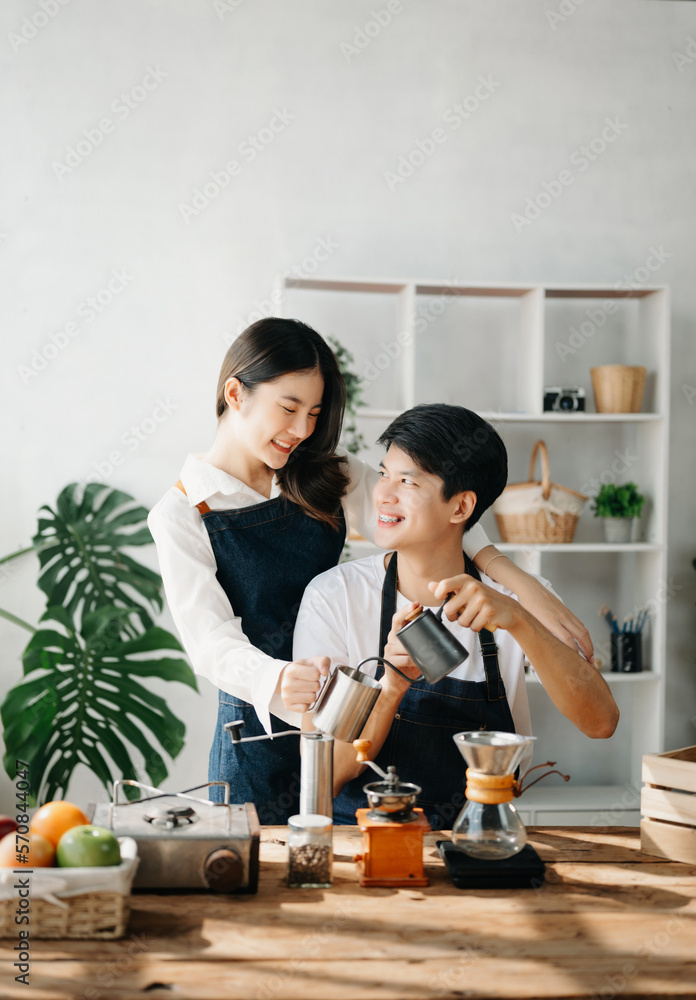 Cute couple, male and female barista working in coffee shop Barista working at cafe Alternative ways