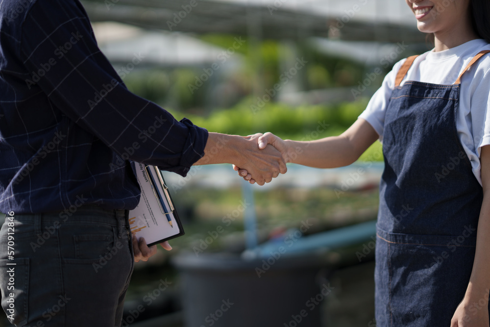 Handshake of business partners Vegetable farmer and customer investor dealing for business trading..