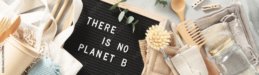 There is no planet b letter board and zero waste no plastic accessories on grey stone background