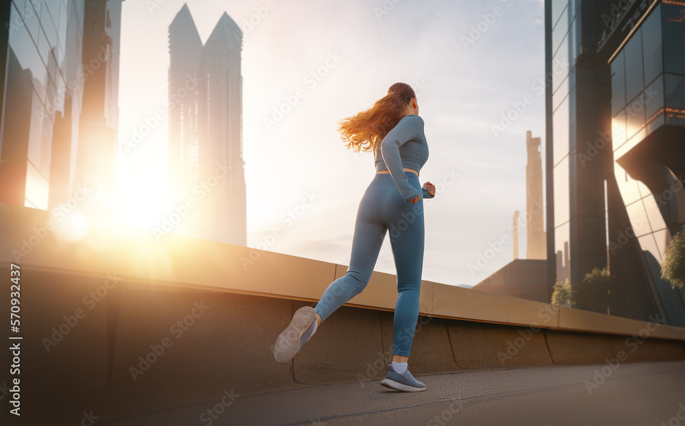 Athletic woman is running