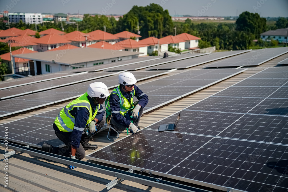 Technology solar cell, Engineer service check installation solar cell on the roof of factory. techni