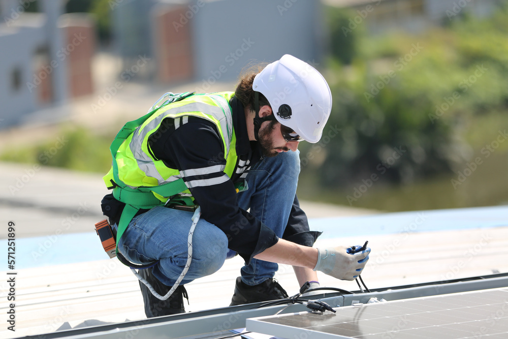 Technology solar cell, Engineer service check installation solar cell on the roof of factory. techni