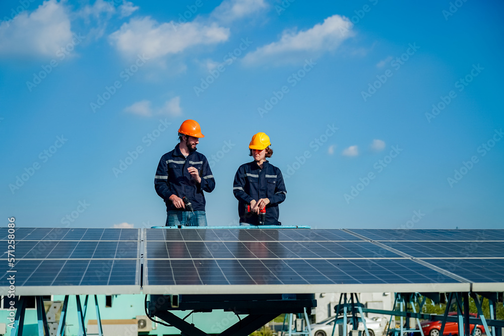 Technology solar cell, Engineer service check installation solar cell on the roof of factory. techni