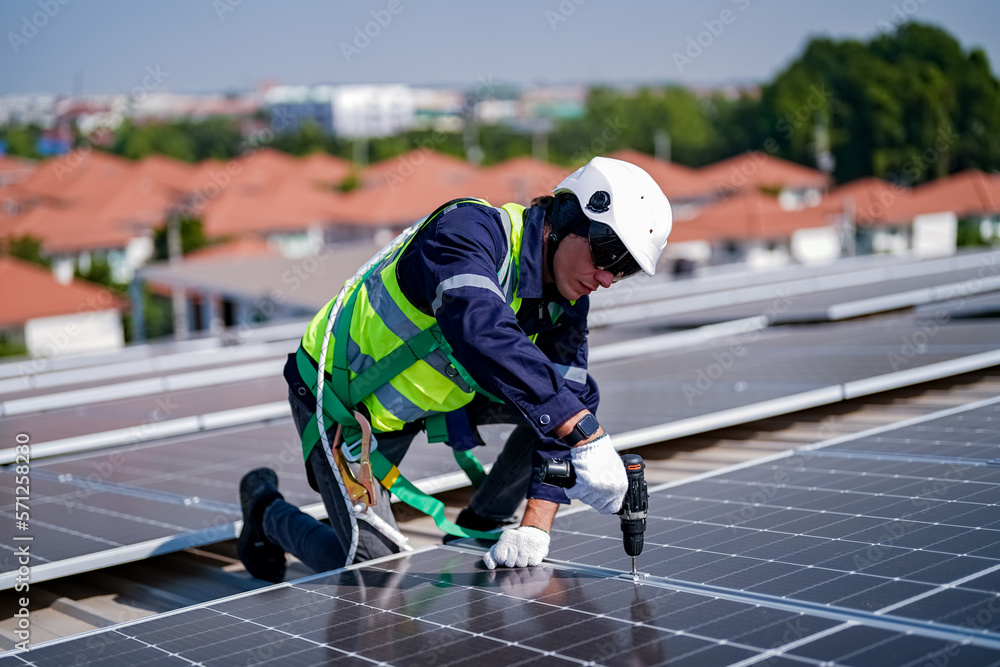 Technology solar cell, Engineer service check installation solar cell on the roof of factory. techni