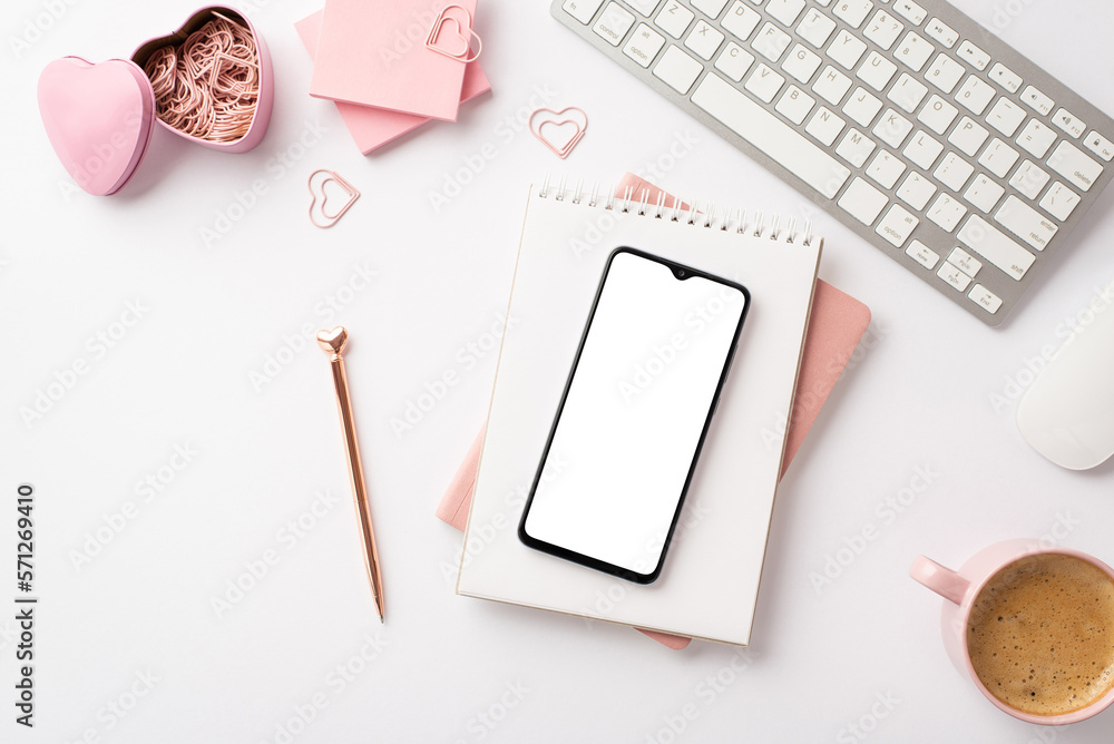 Valentines Day concept. Top view photo of smartphone over diaries pen keyboard sticky note paper he