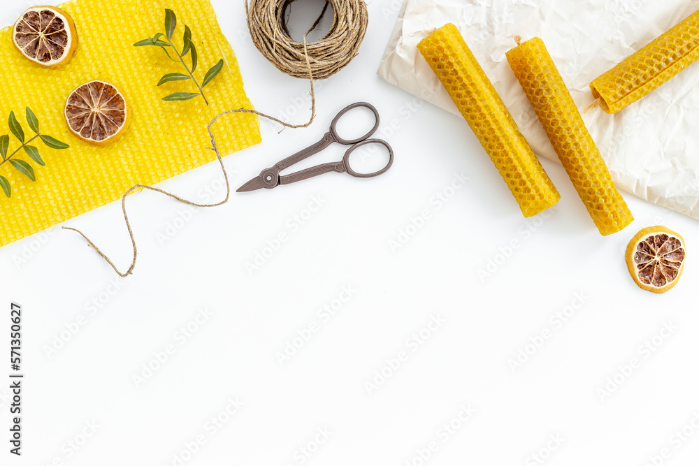 Handmade beeswax honey aroma candles with honeycombs, top view