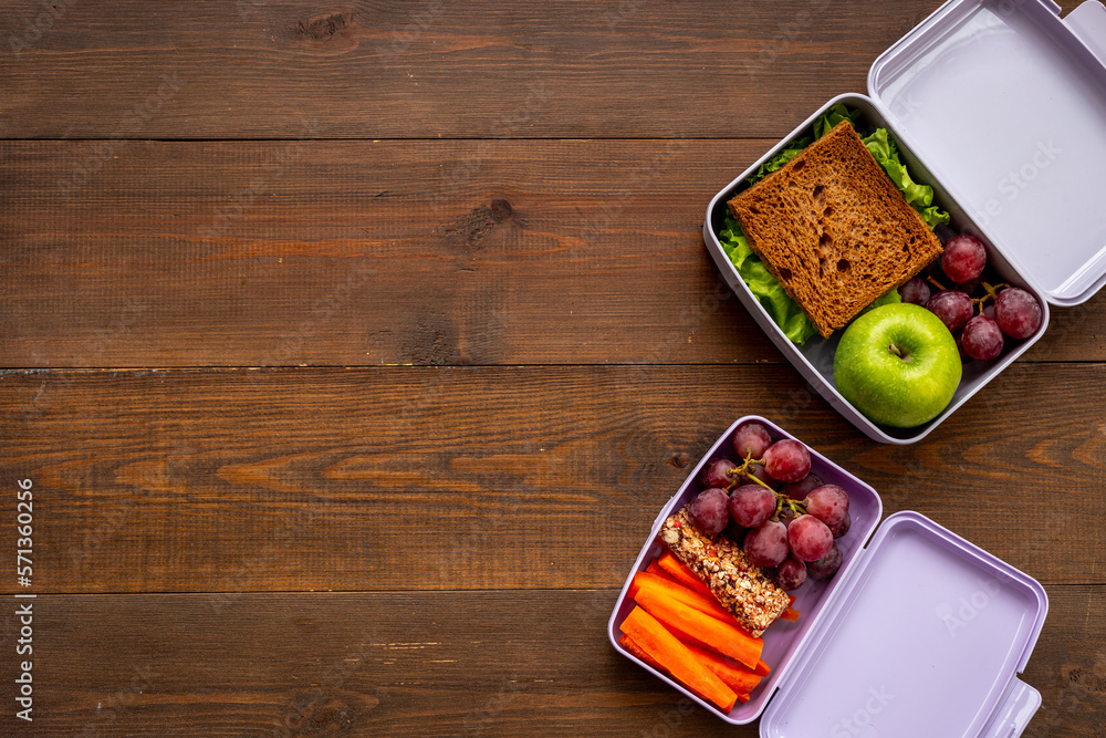 Set of lunch boxes filled with healthy food. Healthy meal