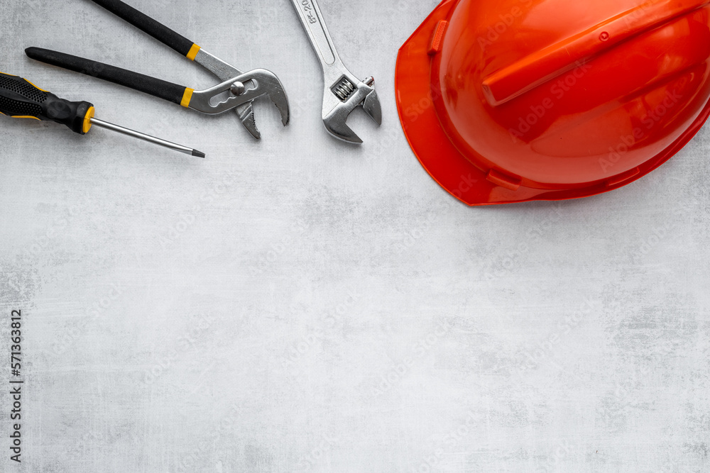 Engineer safety helmet with construction tools, top view