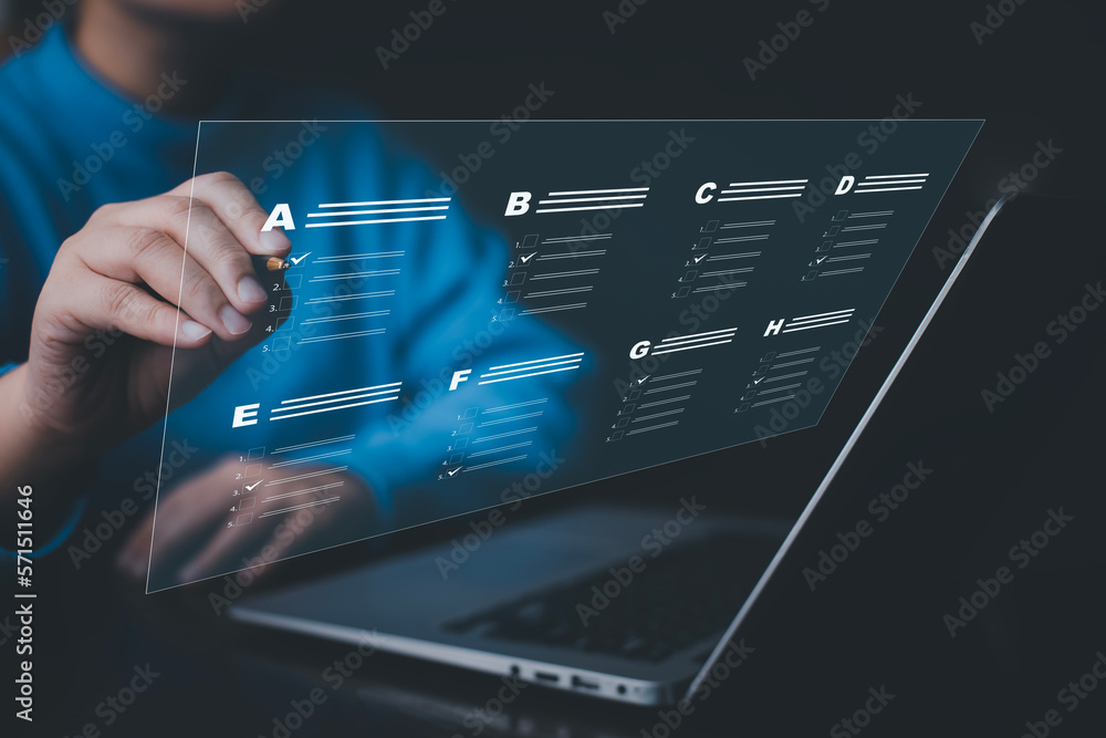 Businessman using a laptop and Taking an assessment, questionnaire, evaluation, online survey online