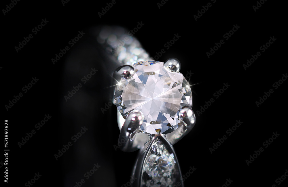 shiny diamond ring on black background