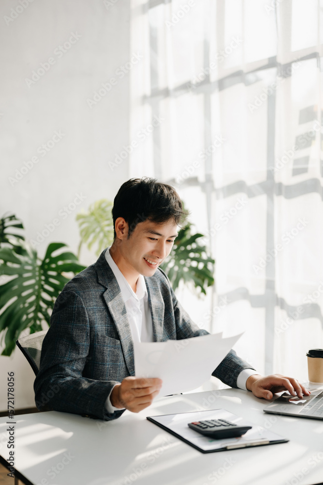 Mature business man executive manager looking at laptop watching online webinar training or having v