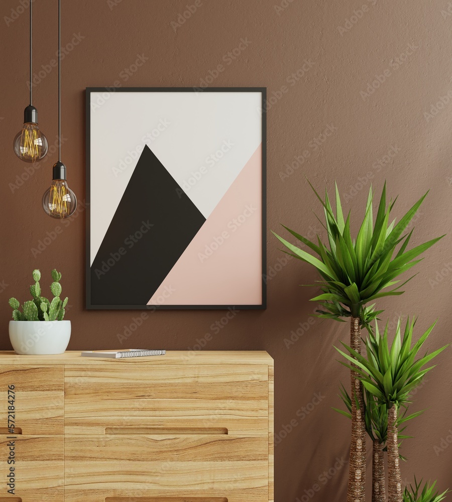 Mock up poster frame in modern interior on dark brown wall background.