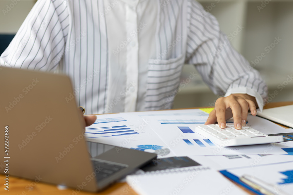 Professional investor or business finance accountant is analyzing market reports to assess the profi