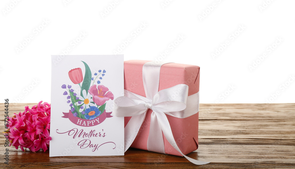 Greeting card with text HAPPY MOTHERS DAY, hyacinth flower and gift on table against white backgrou