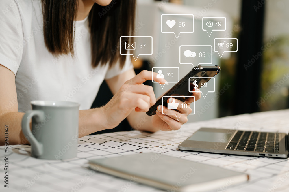 Social media and Marketing virtual icons screen concept.close up of businesswoman typing keyboard ta