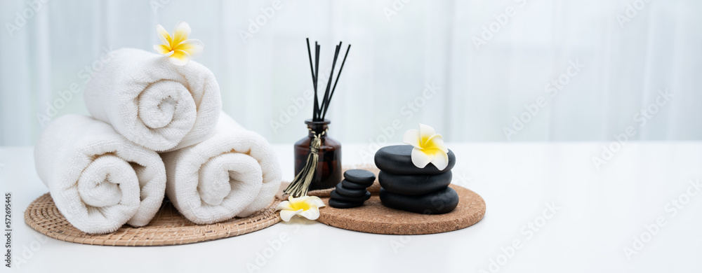 Spa accessory composition set in day spa hotel , beauty wellness center . Spa product are placed in 