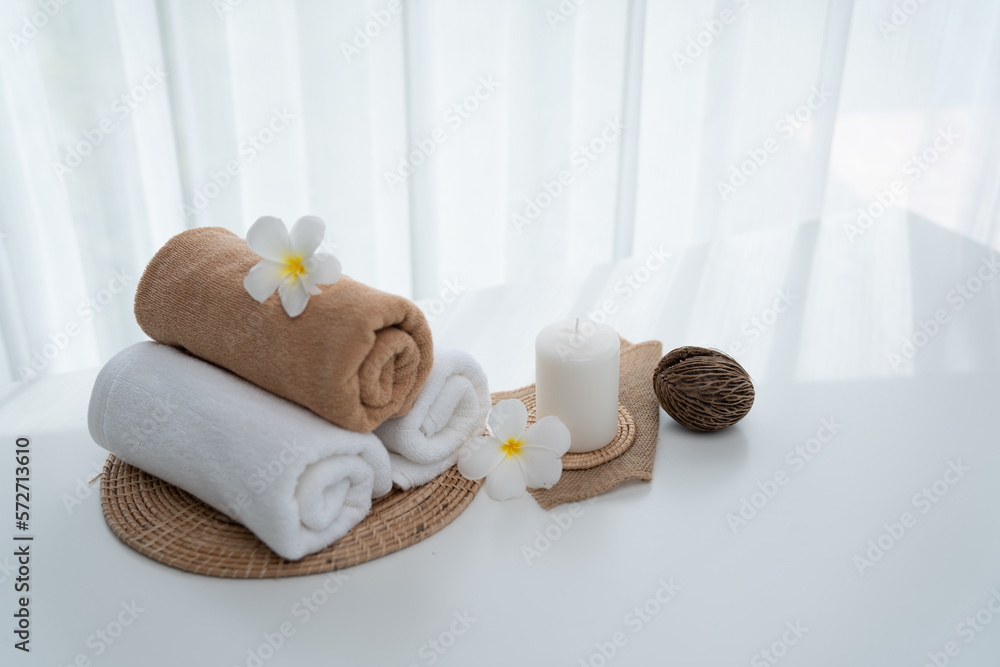 Spa accessory composition set in day spa hotel , beauty wellness center . Spa product are placed in 