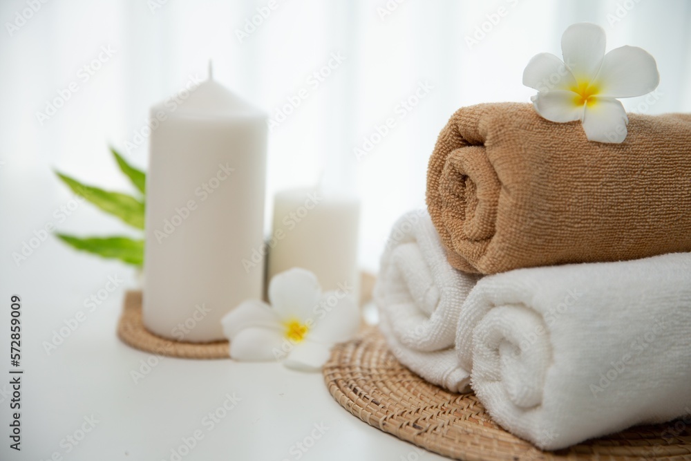 Spa accessory composition set in day spa hotel , beauty wellness center . Spa product are placed in 