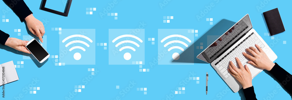 Wifi concept with two people working together