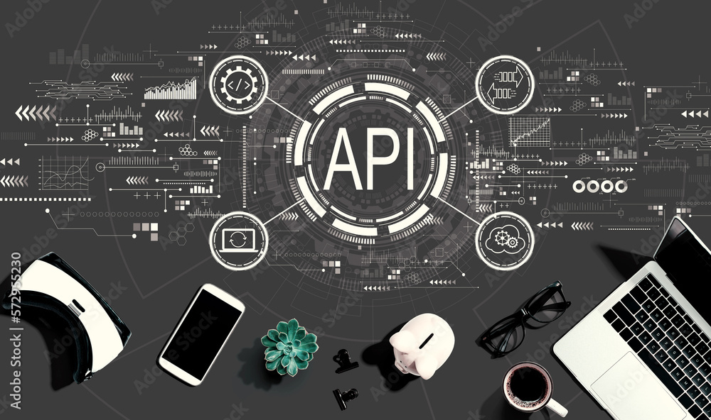 API - application programming interface concept with electronic gadgets and office supplies - flat l