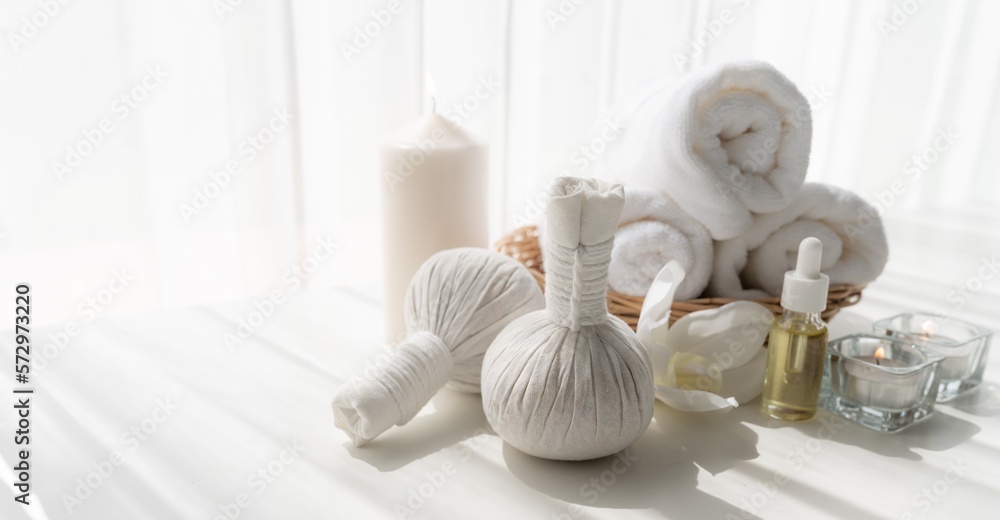 Spa accessory composition set in day spa hotel , beauty wellness center . Spa product are placed in 