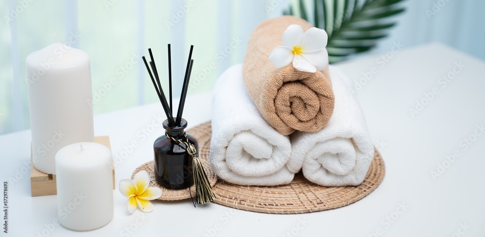 Spa accessory composition set in day spa hotel , beauty wellness center . Spa product are placed in 