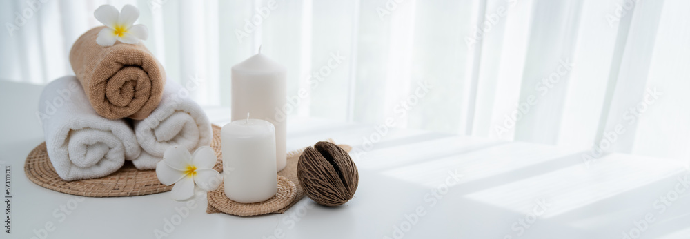 Spa accessory composition set in day spa hotel , beauty wellness center . Spa product are placed in 