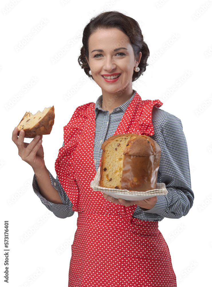 Woman in apron eating panettone