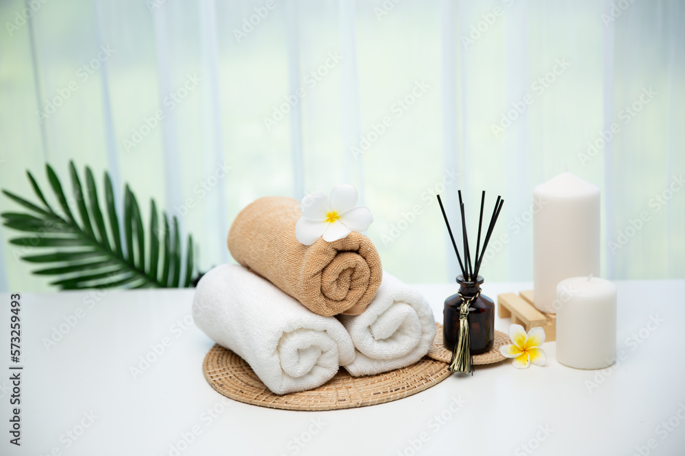 Spa accessory composition set in day spa hotel , beauty wellness center . Spa product are placed in 