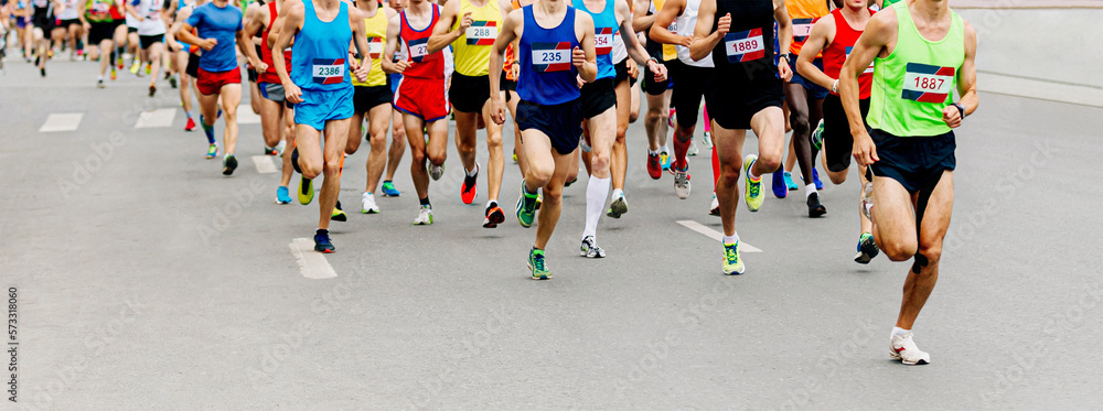 large group man runners running marathon on city street