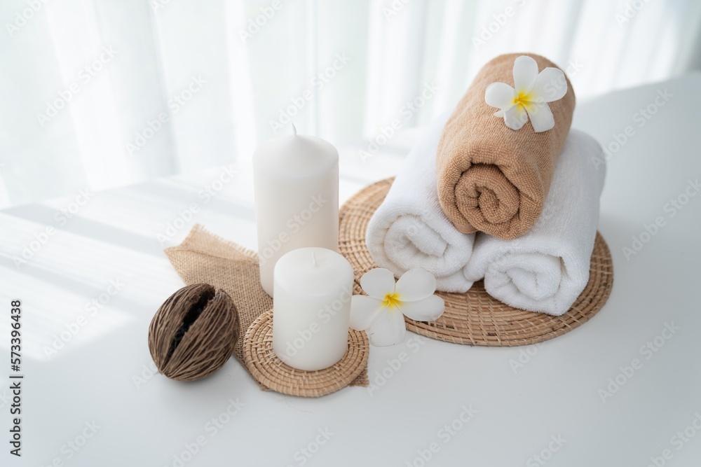 Spa accessory composition set in day spa hotel , beauty wellness center . Spa product are placed in 