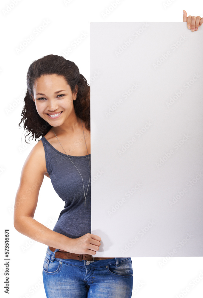 A cheerful young and optimistic girl holding an advertising poster or an empty promo placard for mar