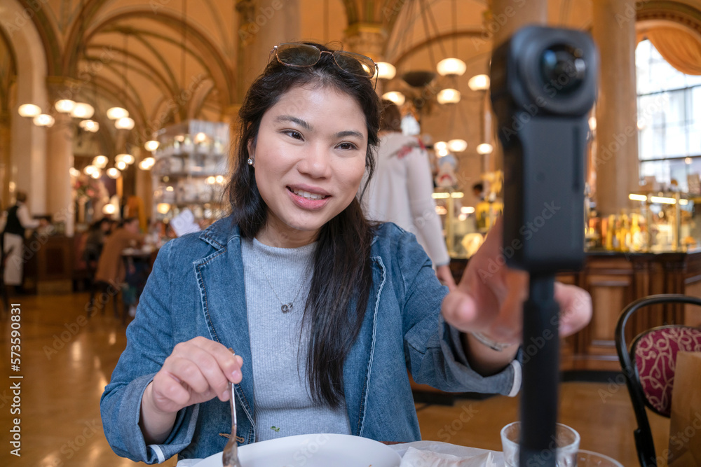 Asia travel vlogger introduce great menu famous restaurant while lives streaming for social reel vid