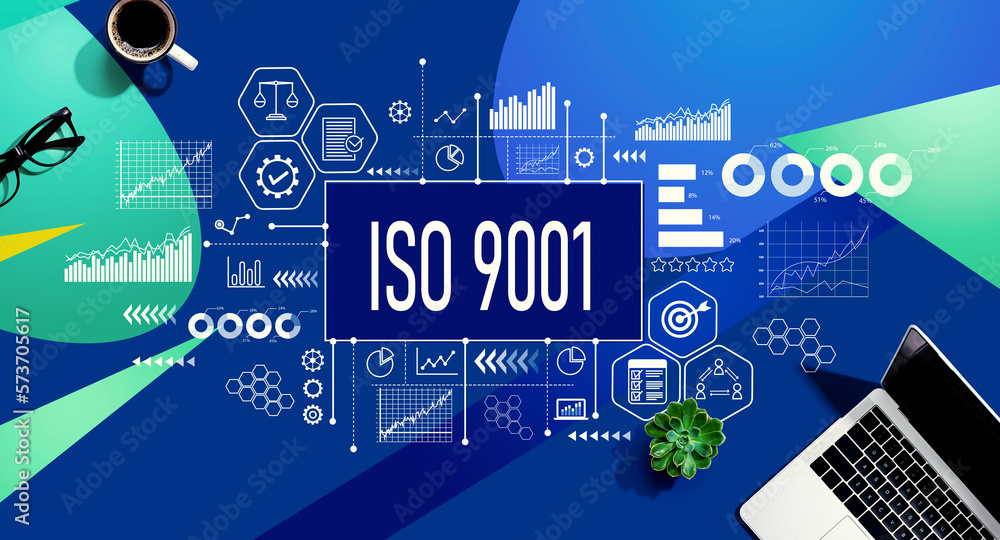 ISO 9001 theme with a laptop computer on a blue and green pattern background