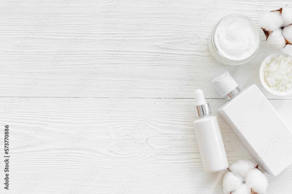 Blank empty white cosmetic tube and bottle, flatlay