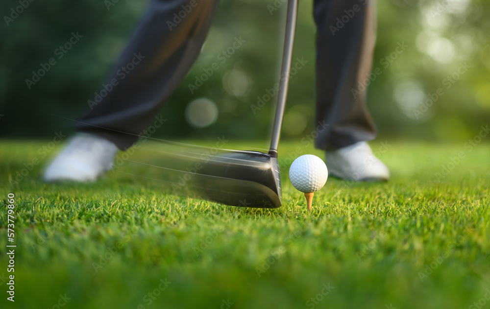 Motion action of teeing off golf ball with drivers.