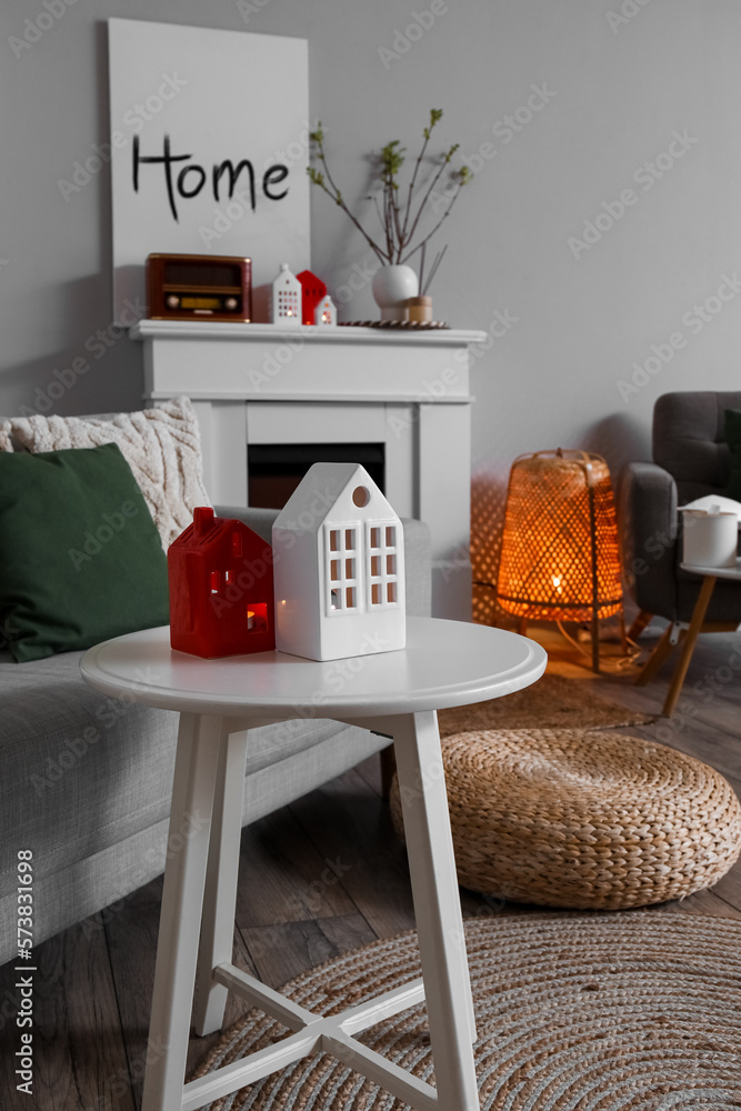 House candle holders on table in modern living room