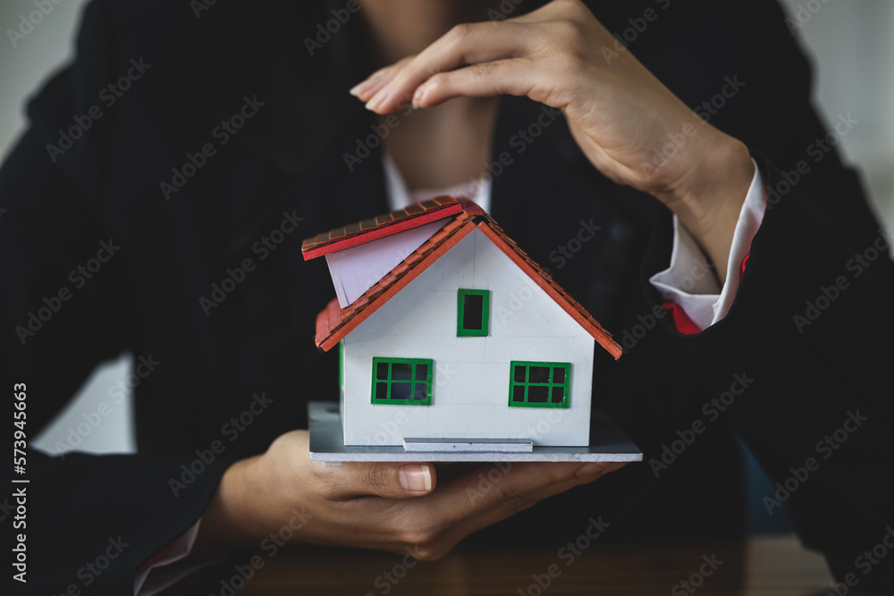 The concept of real estate and home insurance.