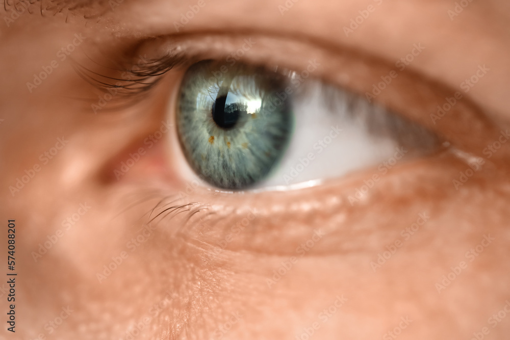 Young man with blue eyes, closeup