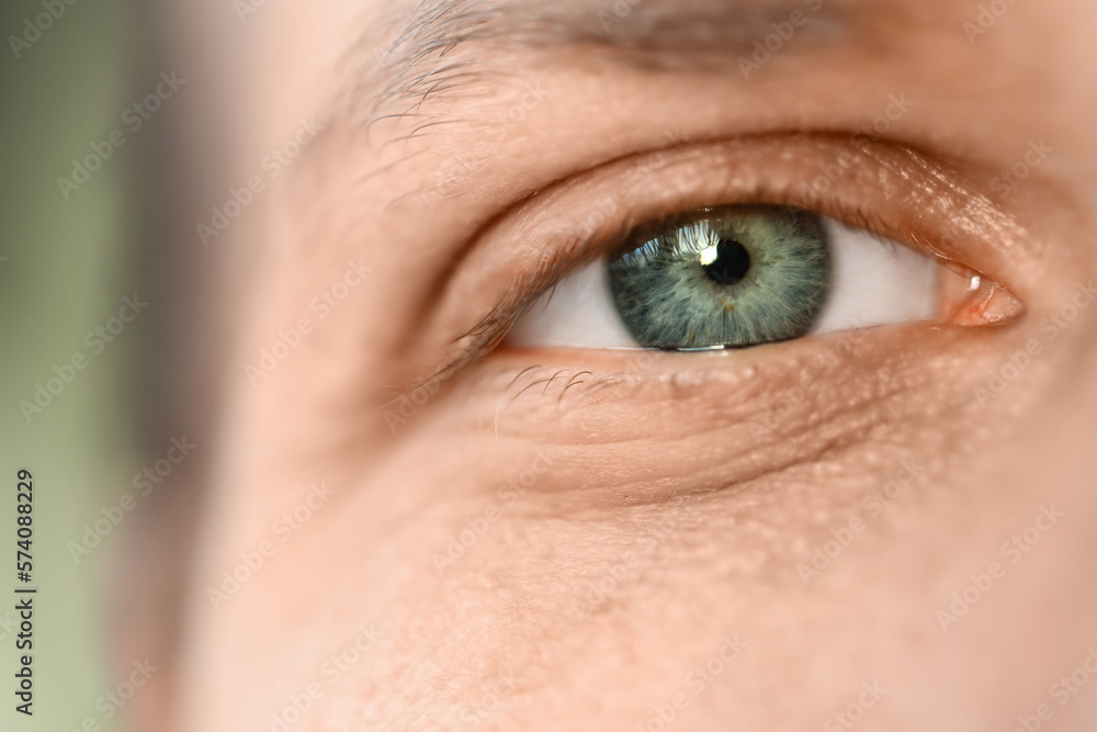 Young man with blue eyes, closeup