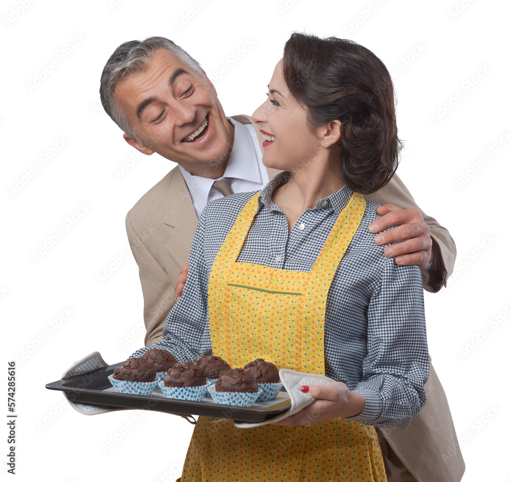 Vintage woman cooking muffins for her husband