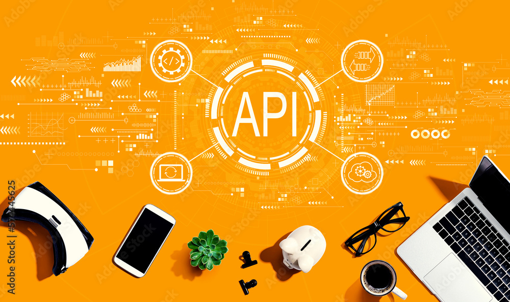 API - application programming interface concept with electronic gadgets and office supplies - flat l