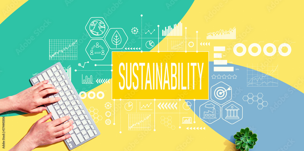 Sustainability theme with person using a computer keyboard