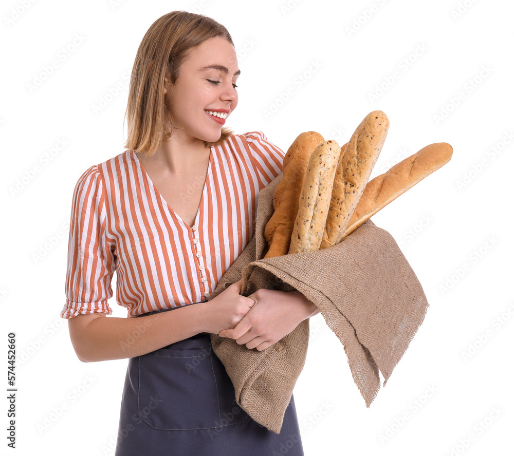 Female baker with fresh baguettes on white background