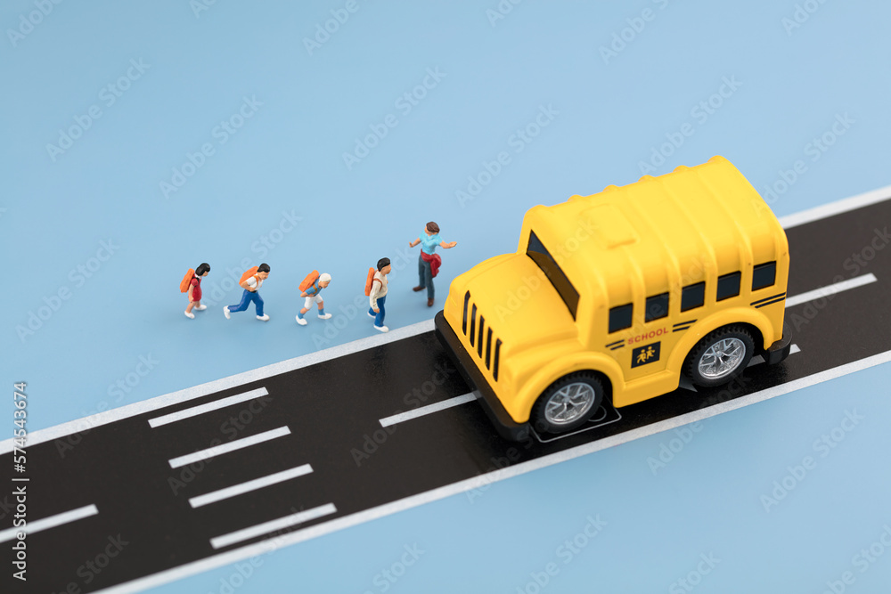 Miniaturized creative school bus to pick up kids on the road