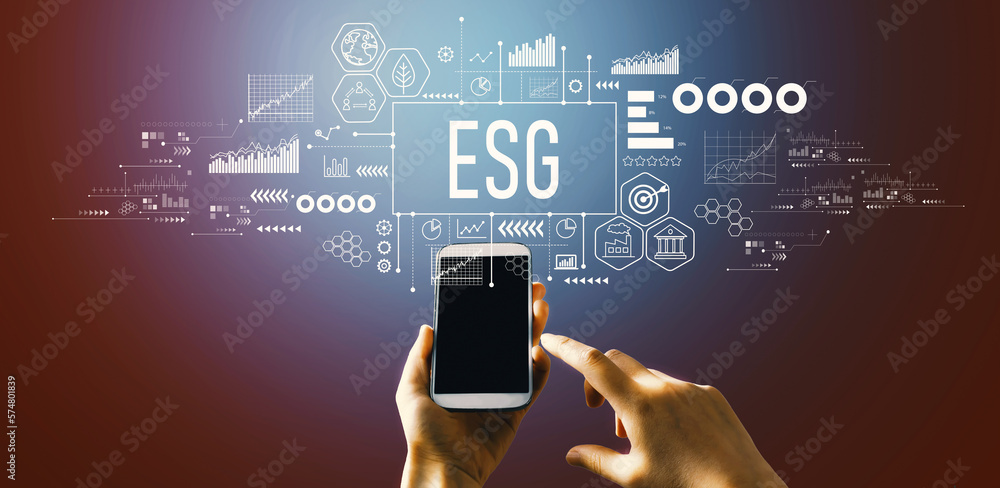 ESG - Environmental, Social and Governance concept with hand pressing a button on a technology scree