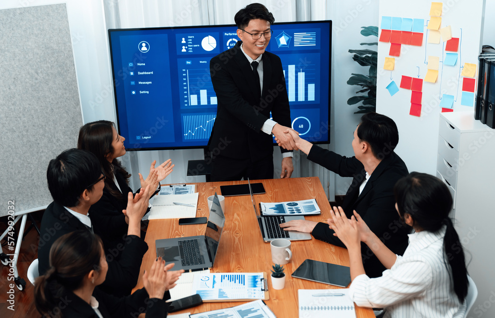 Businesspeople shake hand after successful agreement or meeting. Office worker colleague handshake w