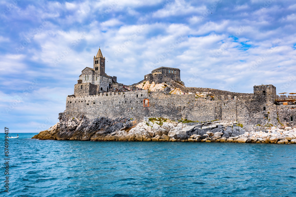 Porto Venere, Italy with church of St. Peter on cliff.