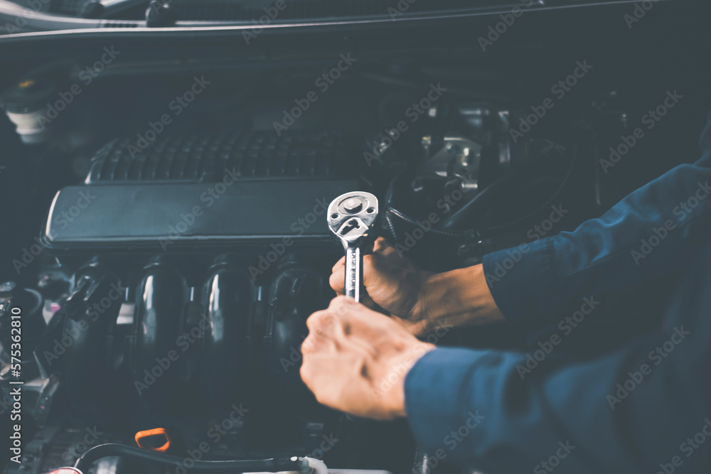 Car service, repair, maintenance concept. Auto mechanic working